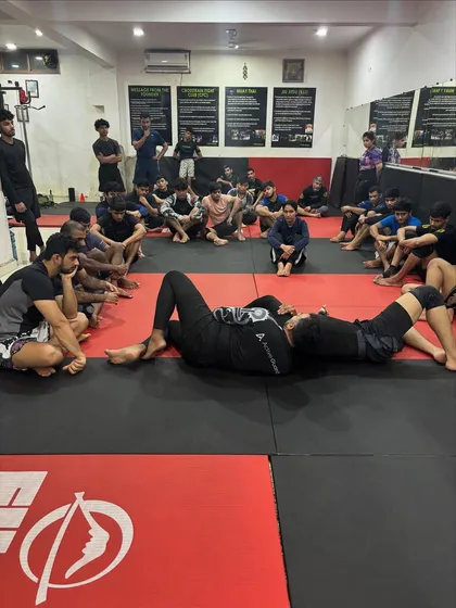 It's all in the details. We spend time breaking down every technique, like this anaconda choke setup, so every student understands the mechanics before drilling it live.