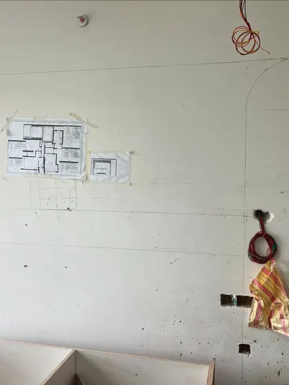 From a floor plan on paper to markings on the wall. This is a critical step where we translate the 2D drawings into the physical space, ensuring every measurement and placement is precise.