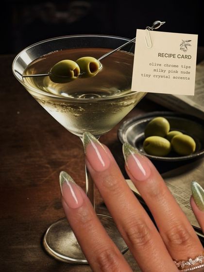 Inspired by a dirty martini, these nails feature a sheer pink base with an olive green chrome tip and tiny crystal accents.