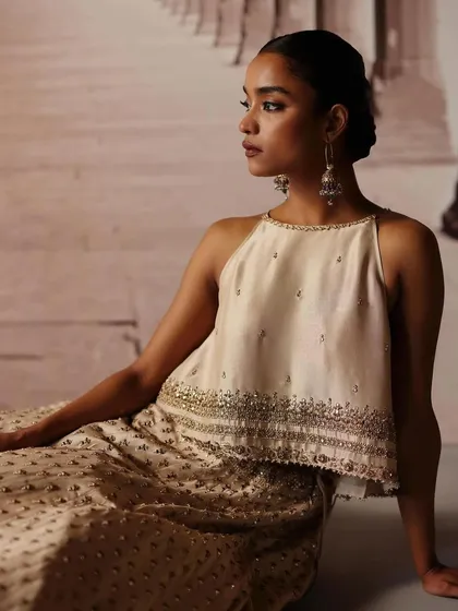 A detail shot from the AR by Rhea Kapoor shoot. The delicate hand-embroidery on the border of this ivory top is simply exquisite.
