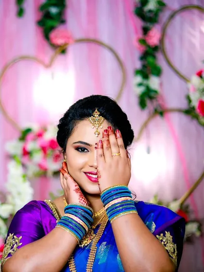 A stunning portrait of the bride-to-be, showcasing her beautiful makeup, jewelry, and the joy of her engagement day.