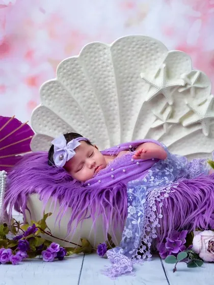 The full view of the mermaid-inspired purple shell setup, showcasing all the carefully placed props that create this magical scene.