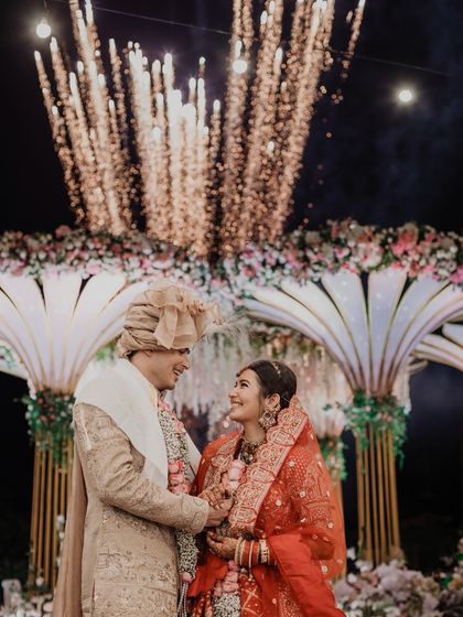 A magical finale to the ceremony, with fireworks lighting up the night sky. This is a perfect example of how we frame your love story against a spectacular, unforgettable backdrop.