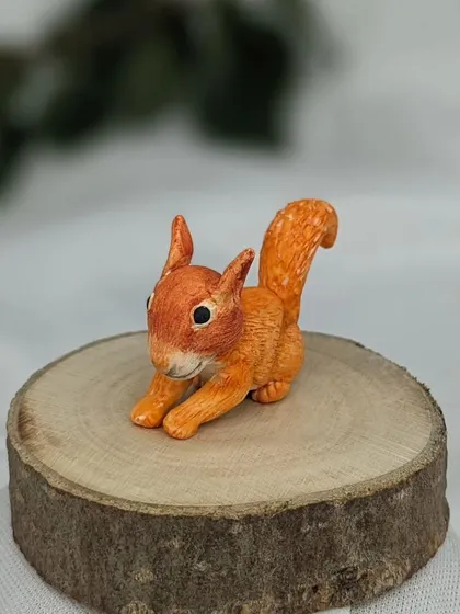 This tiny squirrel is ready to find a new home in a terrarium or on a shelf.