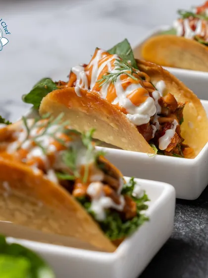 My tacos are crafted to be the life of the party. Served in individual ceramic dishes, these mini tacos are filled with bold flavors and topped with fresh garnishes, making them a perfect, easy-to-eat option for any corporate celebration or team get-together.