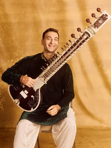 A joyful shot in the green velvet kurta. My smile reflects the happiness that playing music brings me.
