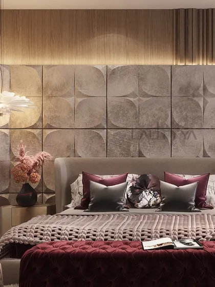 A breathtaking bedroom design from an upcoming project, featuring a unique, textured 3D wall panel behind the bed. The rich burgundy and neutral tones create a warm, inviting, and luxurious atmosphere.