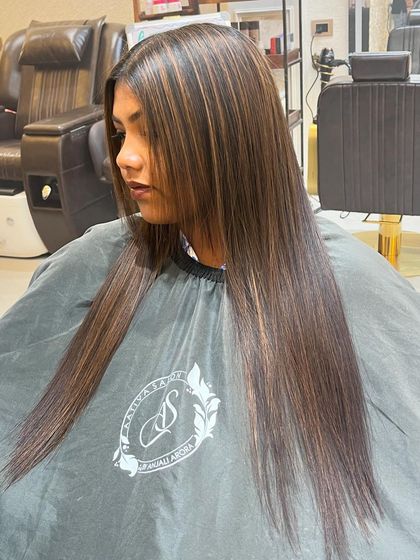 Another view of the botox and highlights combination. The hair is sleek, healthy, and the highlights add a touch of brightness.