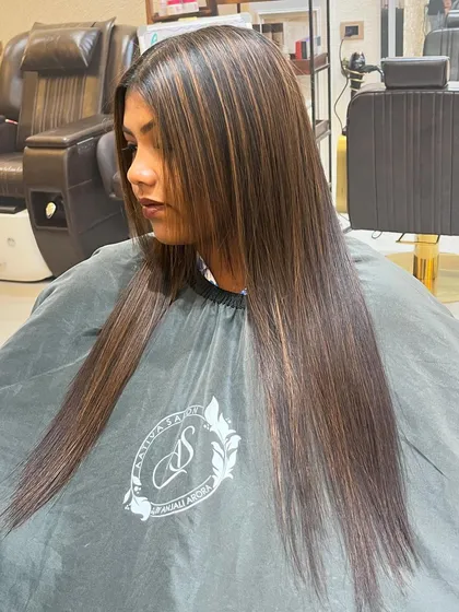 Another view of the botox and highlights combination. The hair is sleek, healthy, and the highlights add a touch of brightness.