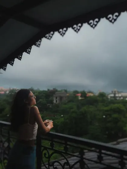 The mood of a monsoon day from a balcony in Goa. I love playing with silhouettes and the soft, diffused light of an overcast sky to create a contemplative and romantic feeling in my films.