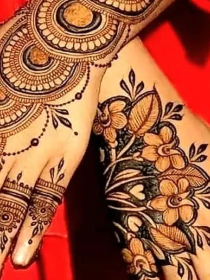 A beautiful fusion design combining a floral vine on one hand with a circular mandala pattern on the other. This asymmetrical look is modern, stylish, and perfect for any celebration.
