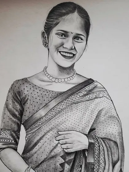 This A3 size portrait of a smiling woman in a saree was a commission work. I used graphite pencils to carefully render the fabric's texture and the joyful look on her face.