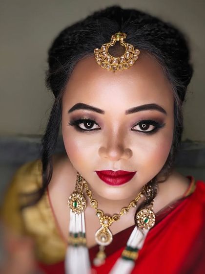 A powerful and artistic shot of the bride, with her eyes being the central focus. This is a perfect example of classic bridal beauty.