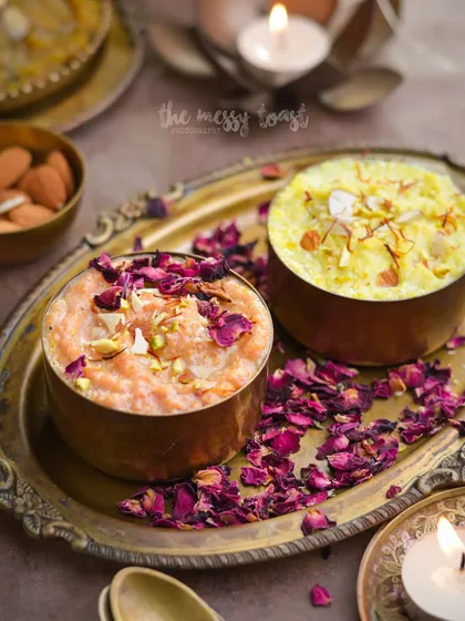 A festive shot of two different kinds of kheer, one with rose and another with saffron. The use of brass bowls and scattered rose petals creates a rich, celebratory mood for Diwali.