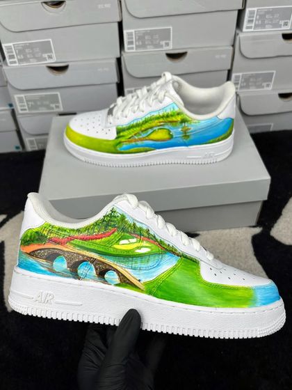 Another angle of the custom golf sneakers, showcasing the vibrant greens and blues.