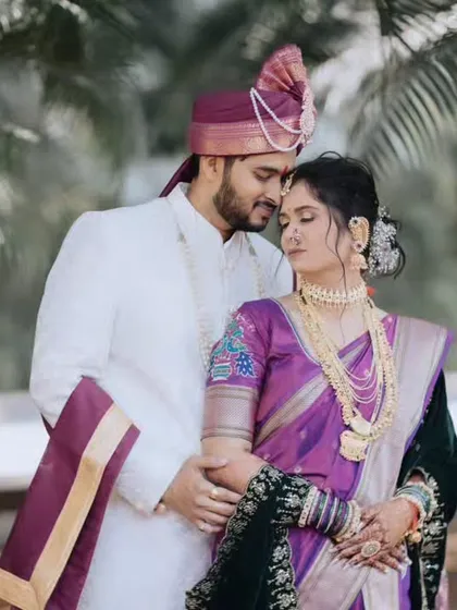 An intimate couple portrait surrounded by nature. The bride's makeup looks soft and natural in the daylight.
