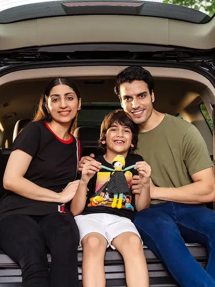 An authentic family moment captured for an MG Motor lifestyle campaign. This shot focuses on creating a relatable, aspirational scene that connects the brand with the joy of family road trips.