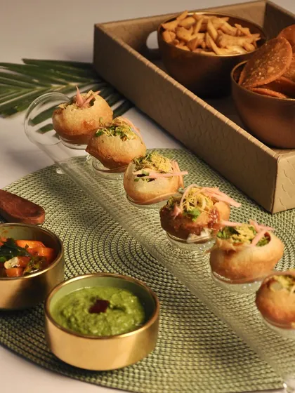 Festive time calls for Bharwa Gol Gappas, served elegantly for guests to enjoy while they mingle. This is a classic street food snack, elevated for your party.