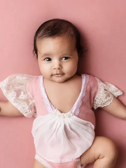 A different pose from the same session, showing her little personality starting to shine through.