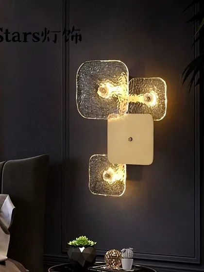A unique wall sconce featuring a cluster of textured glass squares. This fixture is a piece of modern art for your wall.