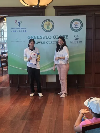 Anahida Behera receives her Runner-Up trophy at the Greens to Glory Junior Golf Tournament.