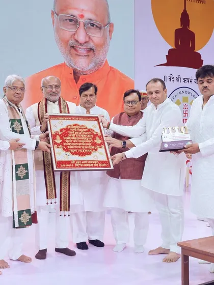 An awards presentation moment during the JITO Navkar Mantra Divas. Our stage and lighting design ensures that key moments like felicitation ceremonies are highlighted effectively for both the live audience and media coverage.