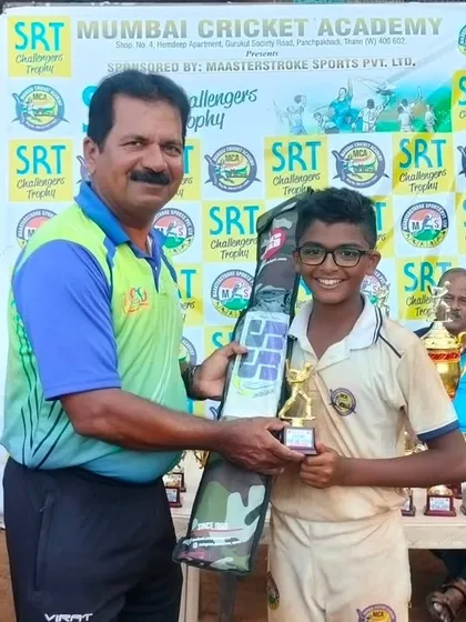 Sarang Joshi receiving his award for being a top performer in the SRT Challengers Trophy.