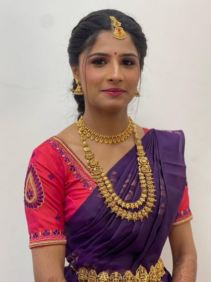 A lovely smile from the bride, showing how comfortable and confident she feels with her complete bridal makeover.