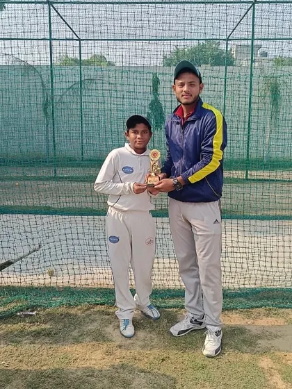 Man of the Match Nishant with his trophy.