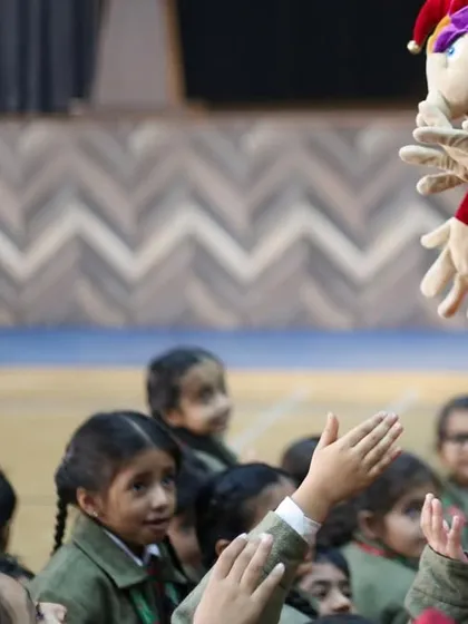 More moments from my travels to schools across the country, each one a unique and joyful experience. From interactive workshops to large assembly performances, I tailor each session to the school's needs.