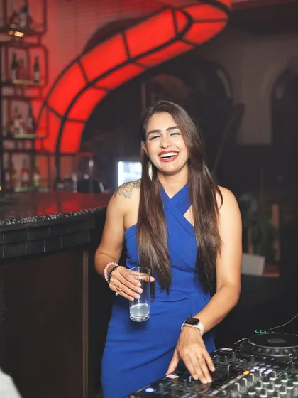 A candid moment of pure joy behind the decks at Molecule, Kanpur. This is me in my element, laughing and connecting with the crowd, ensuring the vibe is always right and the energy is infectious.