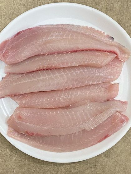 Another look at the fresh, boneless tilapia fillets I offer. They are carefully deboned and ready for you to cook or serve raw.