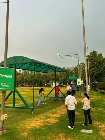 A group of friends and family enjoy a casual Sunday session, with some playing and others watching on.