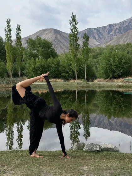 This is the essence of what I seek and share: finding stillness and strength in the heart of nature. Here, practicing Ardha Chandrasana by a serene lake in Ladakh, I am reminded that balance isn't a destination, but a continuous, graceful dance with the present moment.