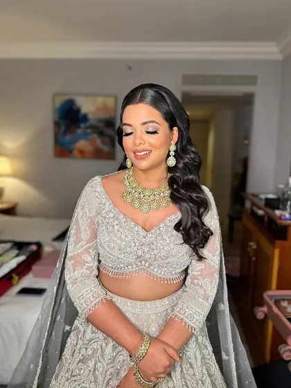A close-up of Shreya's reception makeup, showing the soft yet impactful eye makeup and her radiant complexion.
