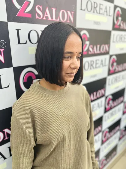 A sharp and chic bob haircut. This is a bold, confident style that is both modern and timeless. I ensure the lines are perfectly clean.