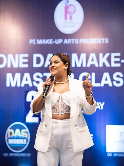 Teaching is my passion. Here I am, explaining a key technique to a large audience. My goal is to make complex makeup simple and accessible for everyone.