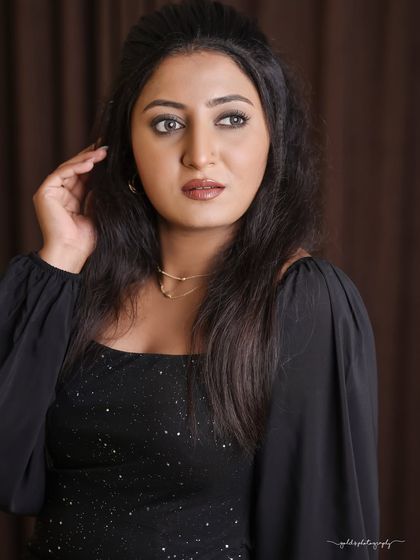 Studio and outdoor portraits of a model in a simple yet elegant black dress. This series focuses on capturing genuine expressions and personality, from joyful laughter to quiet contemplation.