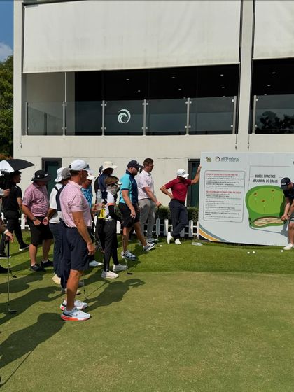 A group of coaches learning about putting green practice strategies. We are constantly seeking new methods to make our training more effective.