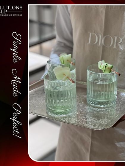 Our refreshing cucumber gin coolers served on a silver tray, a perfect match for the elegant DIOR event.