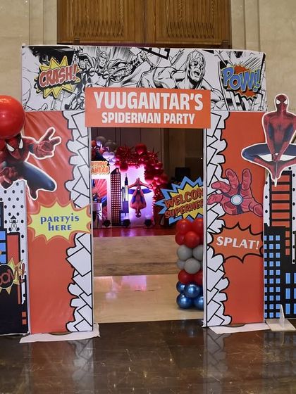 The entrance to Yuugantar's Spider-Man party, designed to look like you're stepping right into a comic book with 'Splat!' and 'Pow!' graphics.