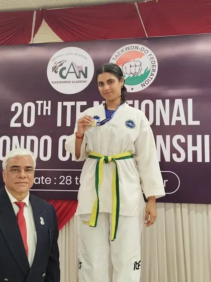 Celebrating a silver medal win at the 20th National ITF Championship. Every competition is a valuable experience for our athletes.