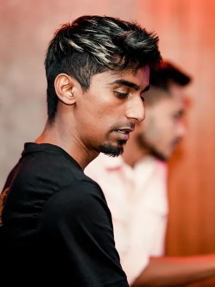 A close-up shot of me in the zone, concentrating on the next track.