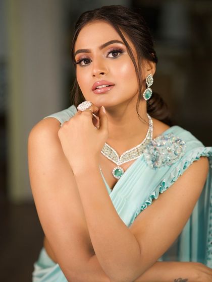 A beautiful portrait of the client, her makeup looking clean, fresh, and modern.