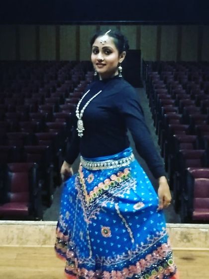 Ready to hit the stage in a colorful Garba skirt for a New Year's performance. Our folk dance numbers are always a crowd favorite, filled with energy and vibrant costumes.