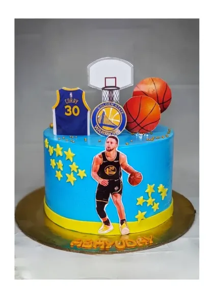 A basketball cake for a Stephen Curry fan. This eggless black forest cake is decorated in the Golden State Warriors' colors, complete with his jersey number.