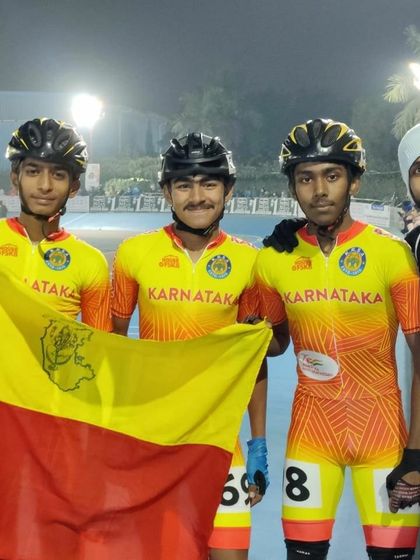 Team Karnataka celebrating together. The camaraderie and support within the team are just as important as individual skill.