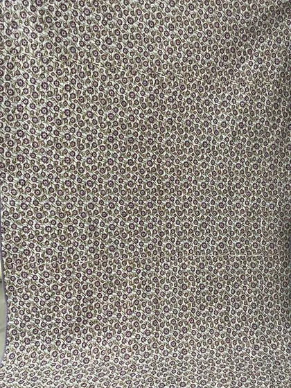 The floral backing fabric for the purple block quilt.