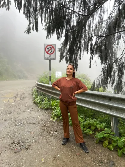 "Sirf sukoon." Just peace. Standing on a misty mountain road, where the fog blurs the world and all that remains is a profound sense of calm.