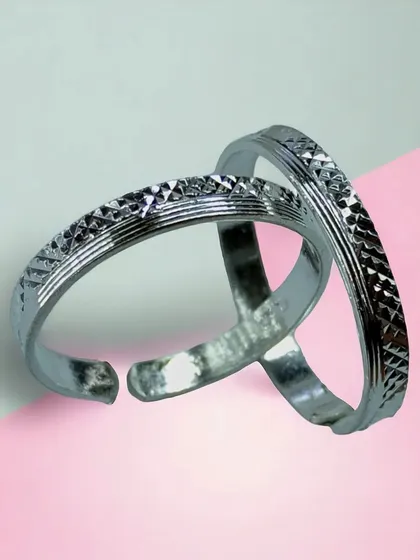 A third shot of the simple silver toe rings, demonstrating their timeless appeal and solid craftsmanship.